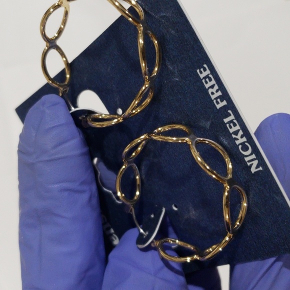 Elegant Gold tone Twisted Design Hoop Earrings - Women's Fashion Jewelry - Picture 6 of 7